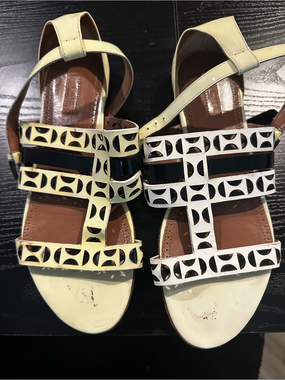 Alaia Cream Cutout T-Strap Sandals